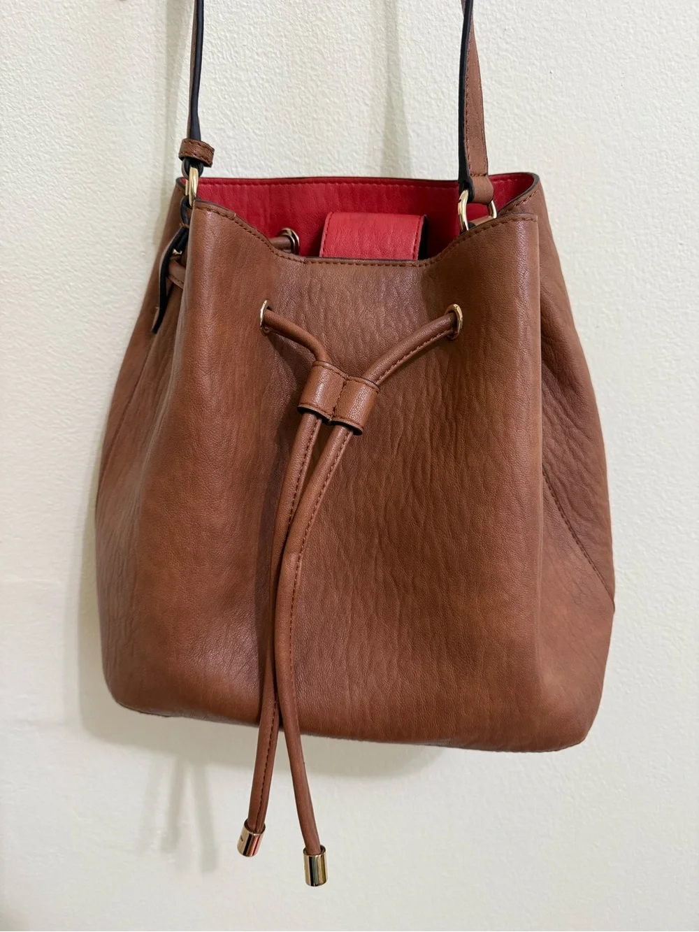 Calvin Klein Brown Leather Drawstring Crossbody with Coral Lining
